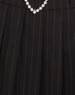 Ayumi Pleated Mini Skirt In Black Pinstripe With Heart Buckle -Outlet Modi Vora Store AYUMI SKIRT BLACK PINSTRIPE 17 W HEART BUCKLE 1690D34