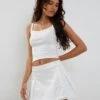 Inica Pleated Mini Skirt In Off White