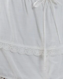 Ryila Frill Mini Skirt In White -Outlet Modi Vora Store OLIVIA ECOMM 20761D1