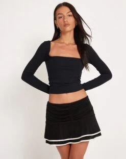 Ranta Mini Skirt In Black With Ivory Binding -Outlet Modi Vora Store RANTA MINI SKIRT SLINKY BLK W IVORY BIND HEM181296