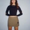 Trin Low Waisted Mini Skirt In Military Khaki