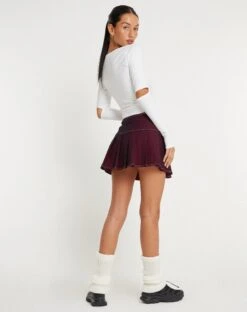 Zabini Low Rise Pleated Mini Skirt In Burgundy With Ecru Stitch Detail -Outlet Modi Vora Store ZABINI SKIRT BURGUNDY 148196 9ed4afbb b031 4af1 9c8a e2e726f05606